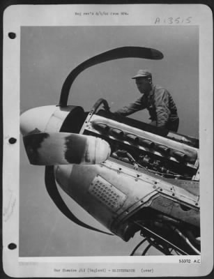Propellers > Shocked amazement is registered in the expression of Sgt. James C. Dalton, of Miami Beach, Florida, as he gets a close-up view of the damage done to the props of a North American P-51 Mustang forced to crash land on its home field uponn return from a