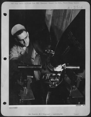 Propellers > S/Sgt. Joseph H. Fulcher, San Antonio, Tex., is shown balancing the propeller of a Boeing B-17 Flying ofrtress. This is highly technical work and must be done in dustless, draftproof room. Minor flak and bullet holes in propeller are filled and each