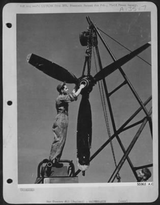 Propellers > T/Sgt. Sam R. Digristina, Brooklyn, N.Y., propeller specialist, has just removed propeller from ofrtress Engine. The propeller will be inspected and balanced before being used again. ENGLAND.