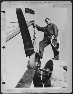 Propellers > PRE-FLIGHT FIXTURES---With a propeller wrench in hand, S/Sgt. James J. Vokoun of Prentice, Mich., swings a four-bladed propeller into place before securing it on to the shaft of a North American P-51 Mustang fighter plane at a base of the U.S. 8th