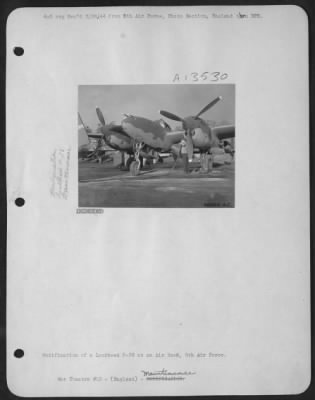 Thumbnail for Refueling > Sgt. Tony A. Cardella, 924 E. 3rd St., Monroe, Mich., refuels the P-51 fighter plane of ace Capt. Don S. Gentile.