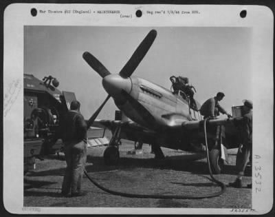 Refueling > before the P-51 Mustang fighter pilot returning from a flight over German-held Europe has had an opportunity to dismount from his plane, the ground crew has already rolled up the gas truck for refueling. After a check-up by the eager ground crew
