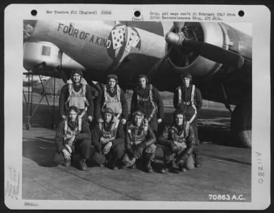 General > A Crew Of The 527Th Bomb Squadron, 379Th Bomb Group, Poses Beside Its Plane - The Boeing B-17 "Flying Fortress" 'Four Of A Kind' At An 8Th Air Force Base In England On 12 October 1944.