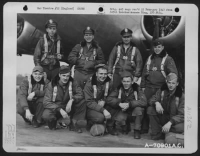 General > Lt. Tuggle And Crew Of The 527Th Bomb Squadron, 379Th Bomb Group Pose Beside A Boeing B-17 "Flying Fortress" At An 8Th Air Force Base In England On 20 April 1945.