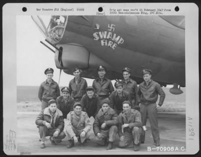 Thumbnail for General > A Crew Of The 525Th Bomb Squadron, 379Th Bomb Group Pose In Front Of A Boeing B-17 "Swamp Fire" At An 8Th Air Force Base In England On 14 March 1945.