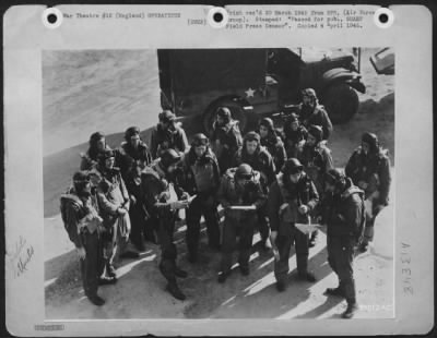 General > As the early morning sun casts long shadows, 8th AF pilots prepare for the second relay on the shuttle-runs that blitzed Nazi transportation in the area ahead of the Rhine crossing Saturday, 24 March 1945. The first 78th Fighter Group pilots took off