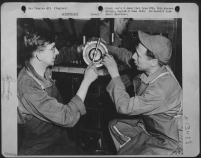 Miscellaneous > Soldier-Technicians At An Air Service Command Depot In England Are Now Installing As Many New Field Coils In Airplane Starter Motors In One Day As Was Formerly Possible In Eight With An Expander Constructed By T/Sgt. James W. Turner (Left) Of East Point,