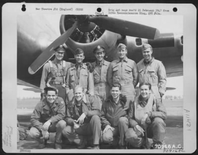 General > A Crew Of The 527Th Bomb Squadron, 379Th Bomb Group Poses In Front Of A Boeing B-17 "Flying Fortress" At An 8Th Air Force Base In England On 26 April 1945.