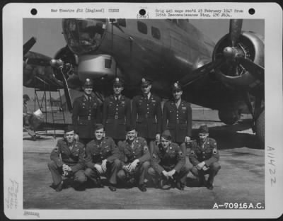 General > A Crew Of The 527Th Bomb Squadron, 379Th Bomb Group Poses In Front Of A Boeing B-17 "Flying Fortress" At An 8Th Air Force Base In England On 20 April 1945.
