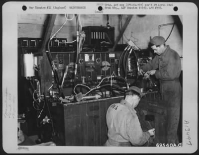 Miscellaneous > Men At Work In The Hydraulic Shop Of The 353Rd Fighter Group At Their Base In England.  4 September 1944.