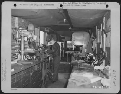 Miscellaneous > Mr. George Ganseon, Compton, Calif., An Employee Of The Lockheed Overseas Corporation Working In Connection With The 8Th Air Force Service Command, Operates A Lathe In A Mobile Trailer At Nr. Bournemouth, Hants, England.  This Mobile Repair Unit Was Sent