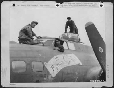 Painting & Washing > Ground Crew Members Clean Windows Of The 401St Bomb Group Boeing B-17 'Heaven Can Wait' In Preparation For Next Mission.  England, 28 June 1944.