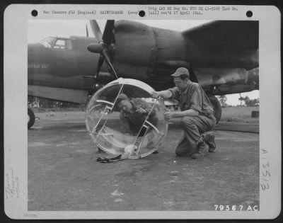 Painting & Washing > Ssgt Carl Palm Of Easton, Massachusetts, And Pvt. Karl Sutherland Of Portland, Maine, Members Of The 323Rd Bomb Group, Wash Down The Plexi-Glass Nose Of A Martin B-26 At Their Base At Colne, England.  20 July 1943.