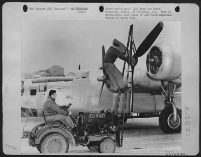 Propellers > Taking Off A 500 Pound Propeller From The Engine Nacelles Of High-Wing Aircraft Was A Difficult Task Until S/Sgt. Joseph Flitter Of Laporte, Ind., At An Air Service Command Depot In England Fitted Up A Standard Model Tug With A Hoist-And-Boom Unit.  He Us