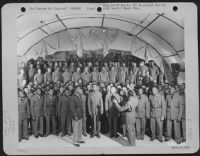 A Negro Choir, Composed Of Volunteers From The 827Th, 829Th, 847Th Aviation Engineer Battalions At Eye, England, Rehearse Under The Direction Of F/Sgt. Alexander B. Jordan Of St. Paul, Minn., While Chaplain William M. Perkins Listens.  1 September 1943. - Page 1