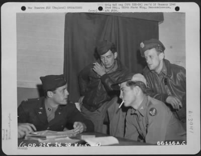 General > Capt. Bonneau Interrogates Lt. Cahill, Sgt. Mccrory And An Unidenfied Member, 381St Bomb Group, After Mission Over Lyons, France.  1 May 1944, England.