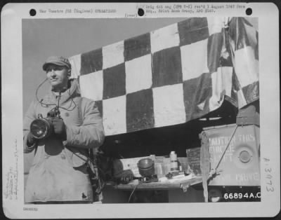 General > Signal Man Flashed Instructions To An Approaching Plane Of The 391St Bomb Group In England, 8 March 1944.