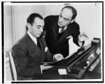Richard Rodgers seated at piano with Lorenz Hart on right.jpg