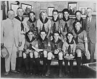 Gerald R. Ford, Jr. poses with other Eagle Scouts and Michigan Governor Fred Green .gif