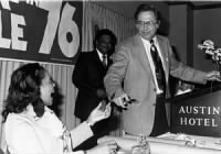 Jake Pickle hands Coretta Scott King a squeaky pickle  at a campaign rally in Austin, 1976.jpg