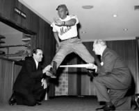 Yogi Berra, Jesse Owens, George Weiss.jpg