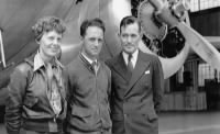 Amelia Earhart with navigators Harry Manning, centres, and Fred Noonan in Honolulu i.jpeg