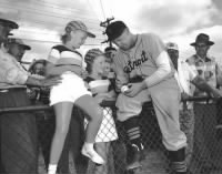 Dizzy Trout signing a ball for a young fan.jpg