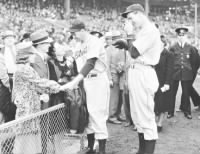 Bobo Newsom, greets Spike Briggs and wife whil Schoolboy Rowe take picture.jpg