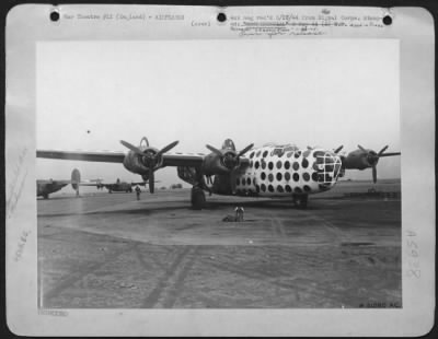 Thumbnail for Consolidated > The gaily painted leadship "First Sergeant", is used at a Liberator base, somewhere in England to organize formations as the Consolidated B-24 Liberators take off on their missions over enemy territory. There are bulb sockets in the side of the plane