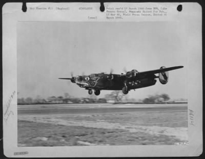 Consolidated > An 8th AF Consolidated B-24 Liberator of the 448th Bomb Group, comes in for a landing at its base in England after completing bombing mission to Swinemunde, Germany docks in support of Russian troops advancing in Eastern Front.