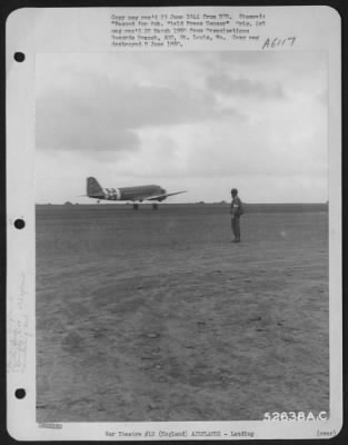 Thumbnail for Douglas > A Chaplain of the 439th Troop Carrier Group presents a lonely figure at the end of the runway as he "sweats out" the return of Douglas C-47 troop carrier planes at an air base somewhere in England. 7 June 1944.