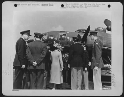 General > King George and Queen Elizabeth congratulating crew members of the Boeing B-17 "Memphis Belle" in England.