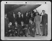 Members of the crew of the "Memphis Belle" pictured with Assistant Secretary of War, Robert Patterson and General Henry H. Arnold, L. to R., Back Row: S/Sgt. Cecil N. Scott, Capt. James A. Verinia, Assistant Secretary of War, Robert Patterson - Page 1