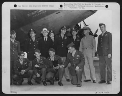 General > Members of the crew of the "Memphis Belle" pictured with Assistant Secretary of War, Robert Patterson and General Henry H. Arnold, L. to R., Back Row: S/Sgt. Cecil N. Scott, Capt. James A. Verinia, Assistant Secretary of War, Robert Patterson