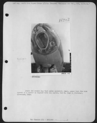 General > Slavo the wonder Dog that makes parachute jumbs, peeps thru the nose turret of a bomber in England with his master, 2nd Lt. Hugh R. Fletcher, Cleveland, Ohio.