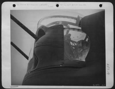 General > S/Sgt. Billie McClennen shown manning nose turret of Consolidated B-24 Liberator.