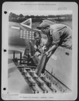 Extreme caution must be exercised in loading the .50 caliber gun of a Republic P-47 Thunderbolt fighter. As it may mean the life of the pilot or another victory. These men are experts as you can see by the number of Jerries shot down by the pilot - Page 1