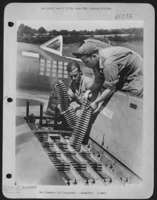 General > Extreme caution must be exercised in loading the .50 caliber gun of a Republic P-47 Thunderbolt fighter. As it may mean the life of the pilot or another victory. These men are experts as you can see by the number of Jerries shot down by the pilot