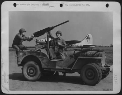 General > Anti-aircraft defenses include gun-toting jeeps like the one shown above, able to cover any spot on the base in a matter of minutes during an emergency. Gunner and driver, who also acts as ammunition feeder can use their mobile .50 caliber weapon