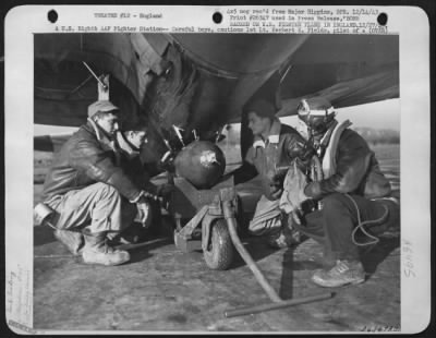 General > A U.S. Eighth AAF Fighter Station--Careful boys, cautions 1st Lt. Herbert K. Fields, pilot of a Republic P-47 Thunderbolt. That's the first bomb ever to be loaded under an American Fighter plane flying from England, and Sgt. Carl E. Trabin, Phila