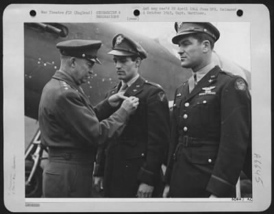 Awards > ENGLAND-General Dwight D. Eisenhower, Supreme Allied Commander of the Invasion forces, presents the Distinguished Service Cross, second highest U.S. Award, to Capt. Don S. Gentile, 23, of Piqua, Ohio, leading fighter pilot in the European Theatre