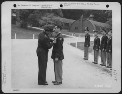 Awards > ENGLAND-Lt. General Lewis H. Brereton, Commanding General of the Ninth Air force, awards the Silver Star to Capt. Warren S. Emerson in ceremonies at the Ninth Air force Headquarters in Britain. Capt. Emerson was a first Lt. when he perofrmed