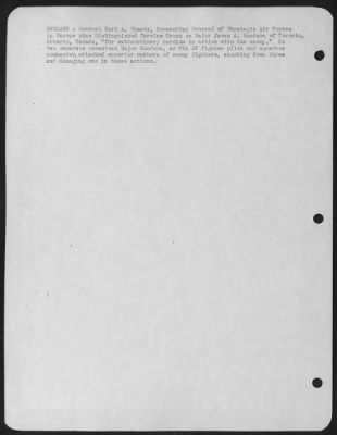 Awards > ENGLAND-General Carl A. Spaatz, Commanding General of Strategic Air forces in Europe pins Distinguished Service Cross on Major James A. Goodson of Toronto, Ontario, Canada, "for extraordinary heroism in action with the enemy." On two separate