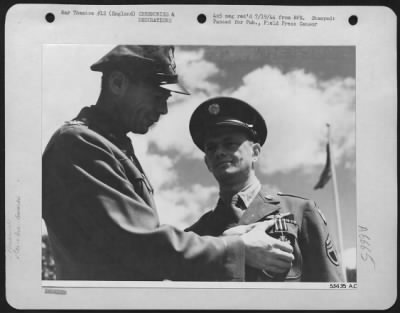 Awards > ENGLAND-The Distinguished Flying Cross is presented to S/Sgt. Paul Saffron, 901 Highview St., Pittsburgh, Pennsylvania, by Colonel Reginald Vance, San Antonio, Texas, Commanding Officer of the Silver Streaks, 9th Air force Marauder group.