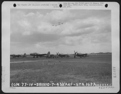 Republic > High Above A Line Of Republic P-47S (Right) And Boeing B-17S (Left) A Formation Of "Flying Fortresses"Flies Over 8Th Air Force Station 167 In England.  10 July 1943.