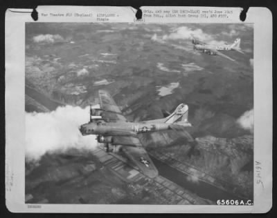 Boeing > Two Boeing B-17 "Flying Fortresses"Of The 401St Bomb Group In Flight Over England, 12 April 1945.