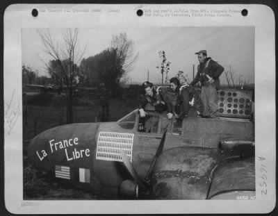 General > The air crew of the Douglas A-20 Havoc, "La France Libre," the first 9th AF light bomber to complete 100 missions against German military objectives. Left to right: Capt Hugh A. Monroe, 21, of 325 Hazelwood Ave., San Francisco, Calif., pilot;