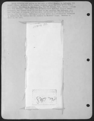 Gunner > Quick thinking and action on the part of S/Sgt Douglas B. McKirgan, 515 Sawmill River, Aidsley, N.Y., right, probably saved the life of his fellow tail gunner, Sgt Frank A. Matthes, Jr., Box 726 Sidney, Neb., during a recent raid over Germany.