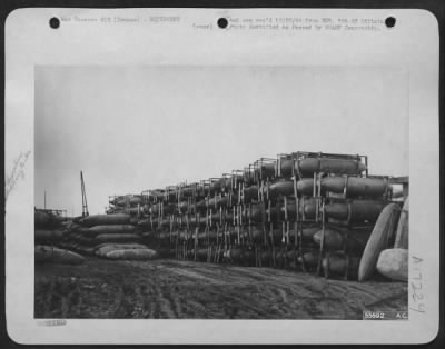 General > Auxiliary gas tanks Air Service Command Depot, ready for attaching to belly of fighter bombers. FRANCE.