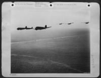 On "D-Day" Douglas C-47 Troop carrying planes of the 9th AF, towing gliders loaded with airborne infantry are on the way to the French coast to participate in the initial assault behind enemy lines, while down below naval units make their way toward - Page 1